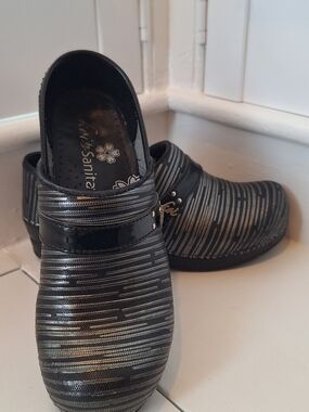 Sanita Women’s Black And Silver Striped Slip-On Clog from the Koi Collection